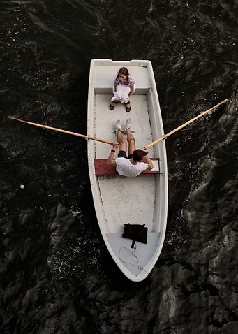Rowboat with man and child