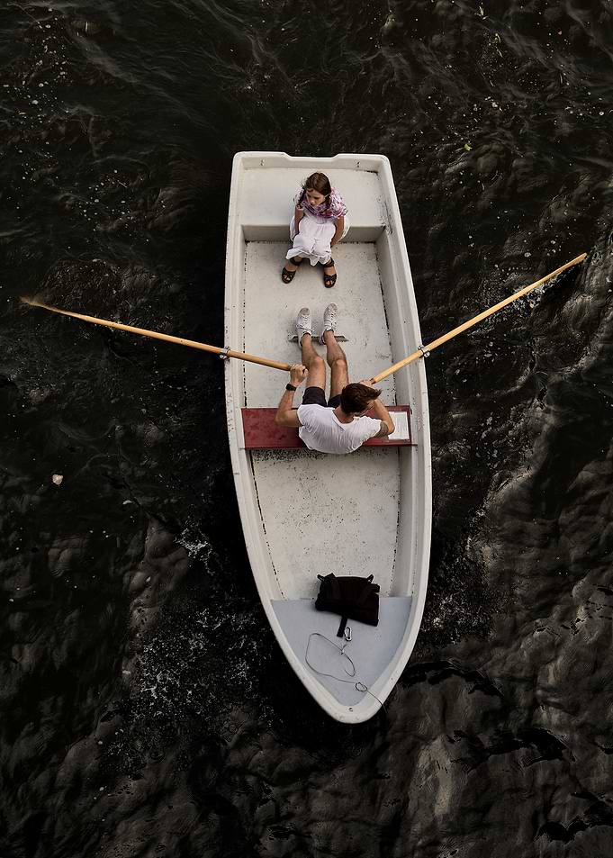 Rowboat with man and child