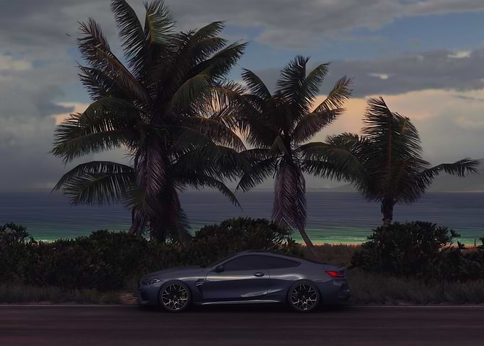 Luxury car on tropical beach road