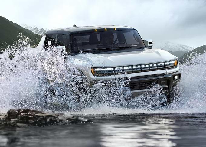 Hummer EV driving through water