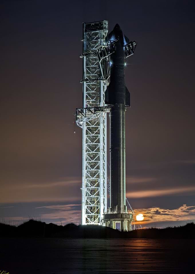 SpaceX Starship at Night with Launch Tower