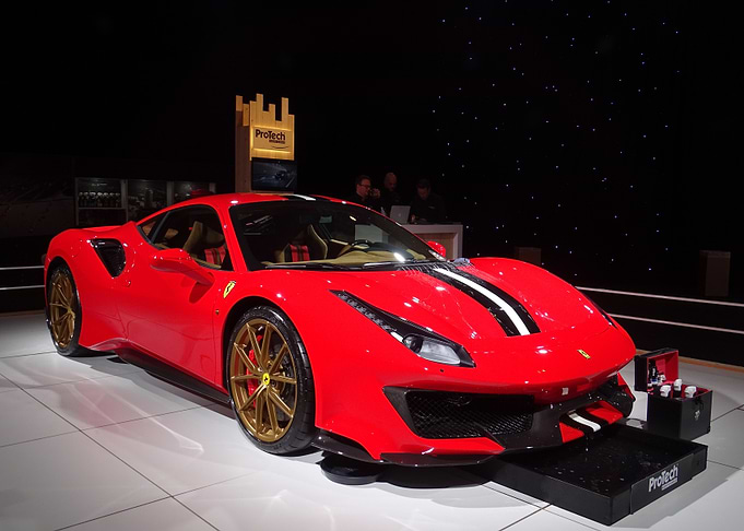 Red Ferrari with Gold Wheels