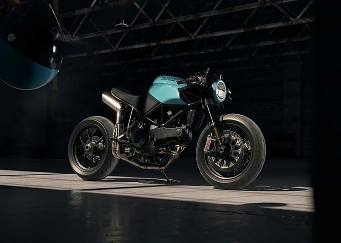 Custom Ducati Motorcycle in Dark Garage
