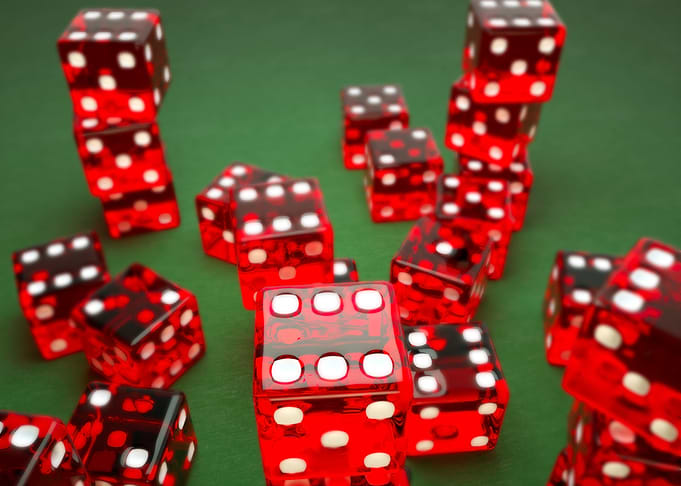 Red Dice on Green Background