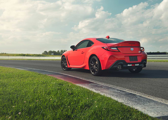 Red Toyota GR86 on Racetrack