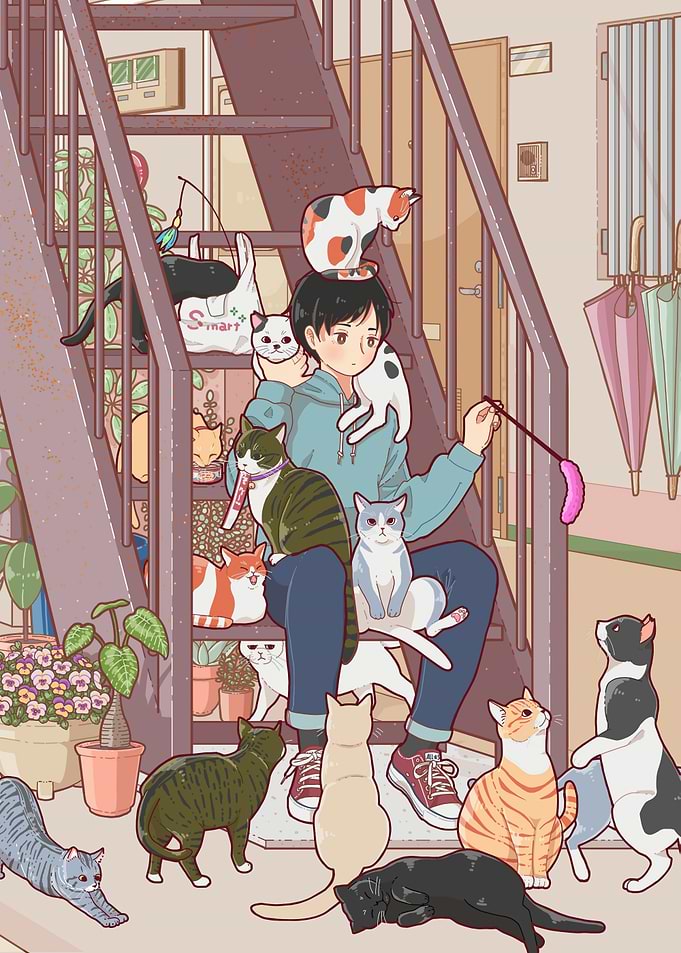 Boy surrounded by cats on stairs