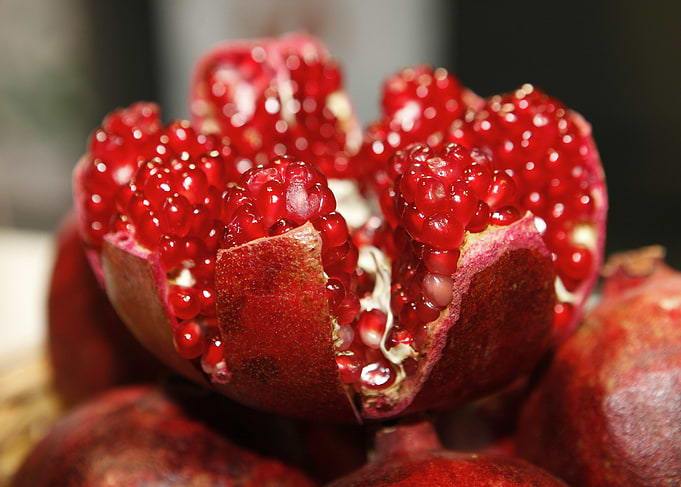 Ripe Pomegranate Bursting with Seeds