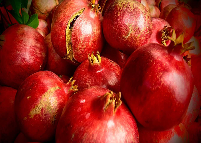 Pile of Fresh Red Pomegranates