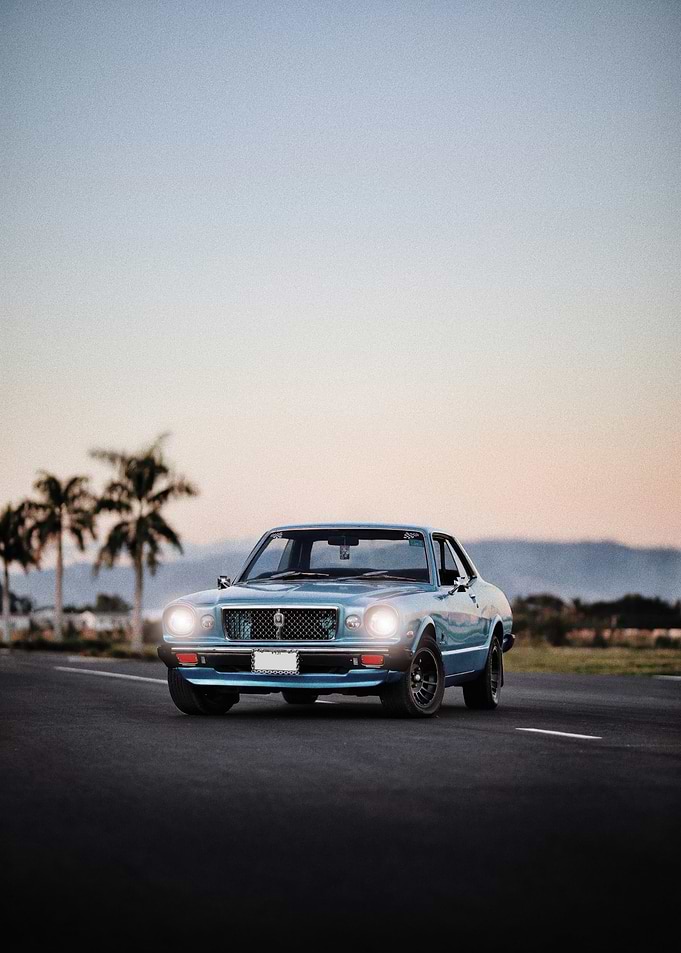 Classic Blue Car on Road
