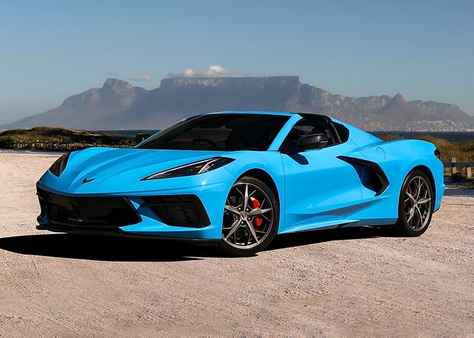 Blue Corvette on Beach