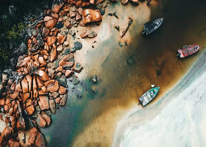 Aerial View of Boats on Sandy Shore