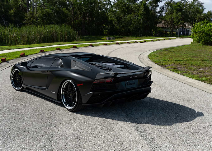 Sleek Black Lamborghini Aventador on Road