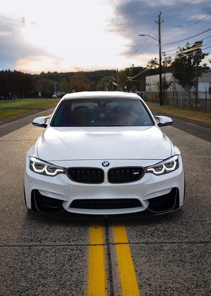 White BMW M4 on Road