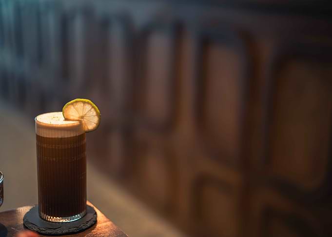 Coffee cocktail with lemon slice