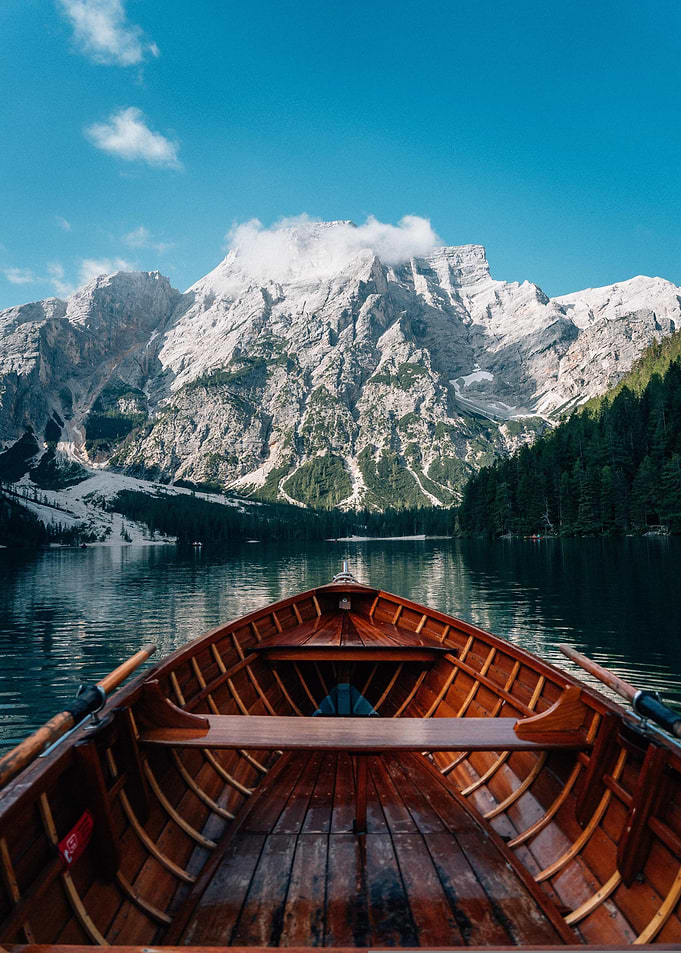 Boat on Lake with Mountain View