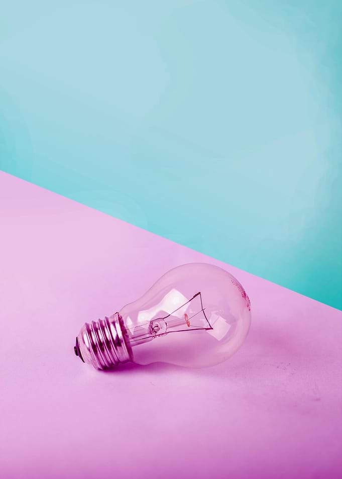 Light Bulb on Pastel Background