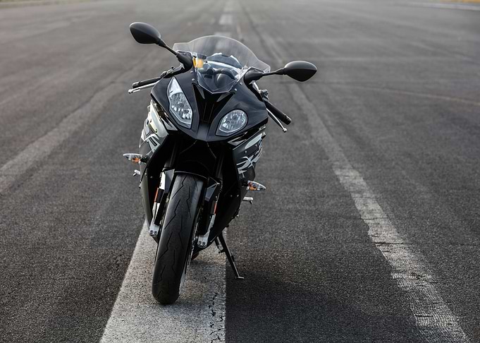 Black Motorcycle on Asphalt Road
