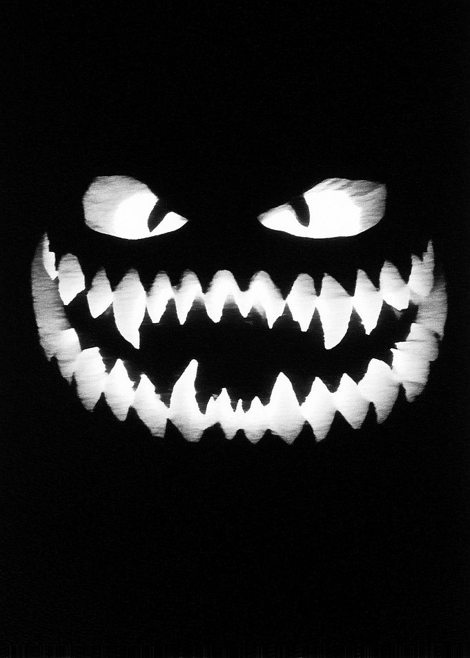 Spooky Face with Sharp Teeth