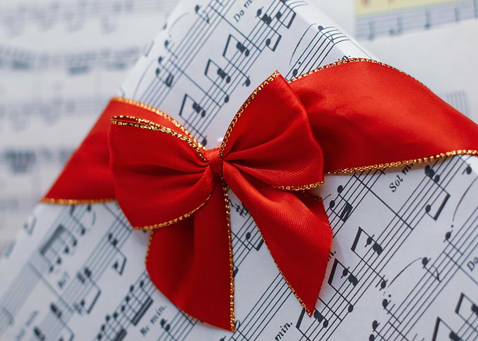 Gift wrapped in music sheet paper