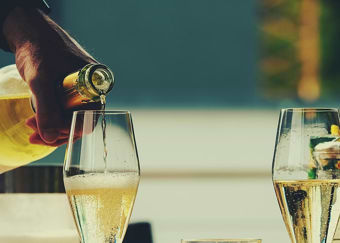 Pouring Champagne into Glass