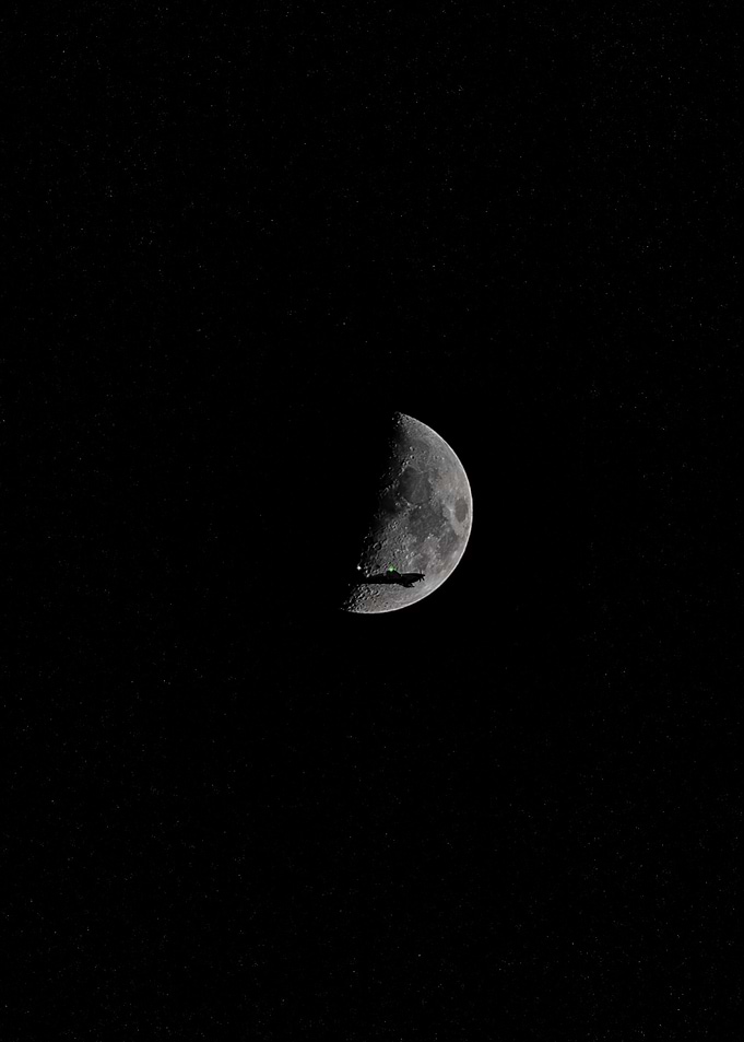Moon and Aircraft Silhouette