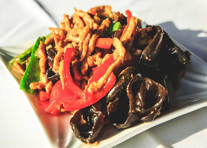 Moo Shu Pork Dish on White Plate