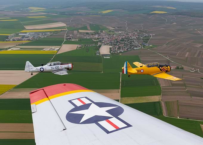 Aerial view of vintage airplanes in flight