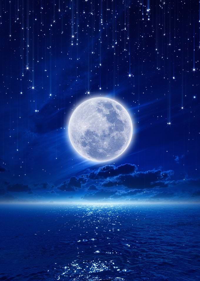 Full Moon Over Ocean at Night