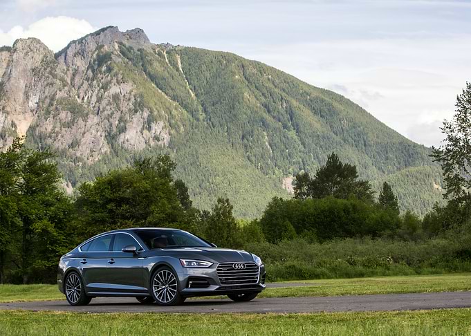 Gray Audi A5 with Mountain Backdrop