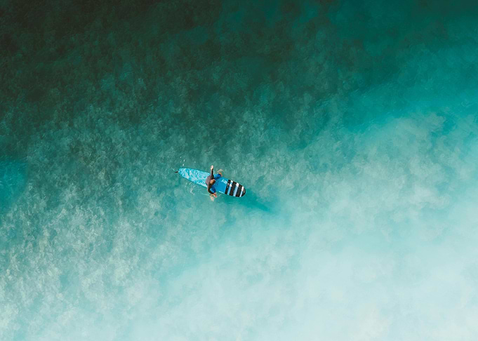 Surfer on Turquoise Water, Aerial View