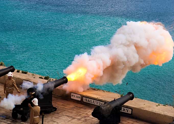Cannon firing with smoke and fire