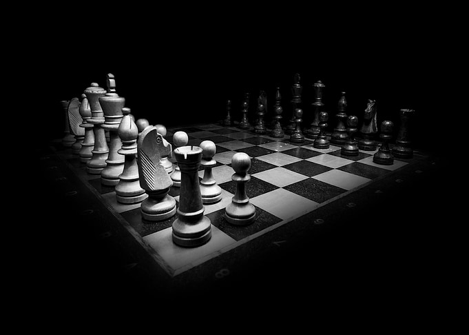 Chessboard with Pieces in Black and White