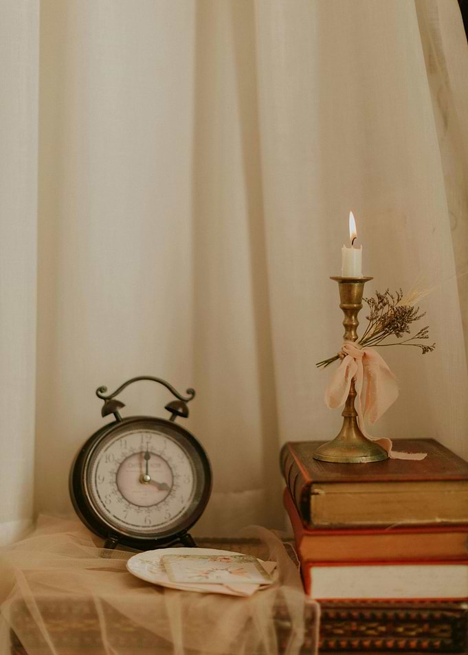 Vintage Still Life with Clock and Candle