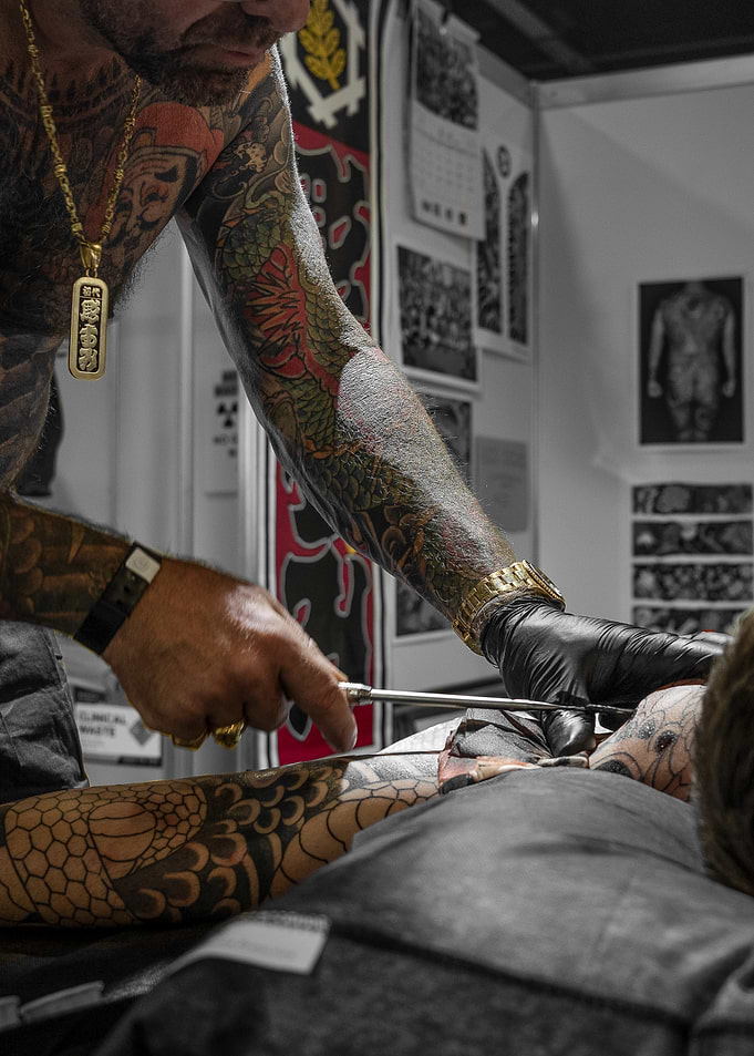 Tattoo artist at work