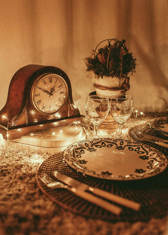 Elegant Table Setting with Vintage Clock