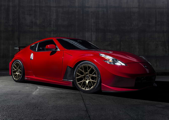 Red Nissan 370Z with Gold Wheels