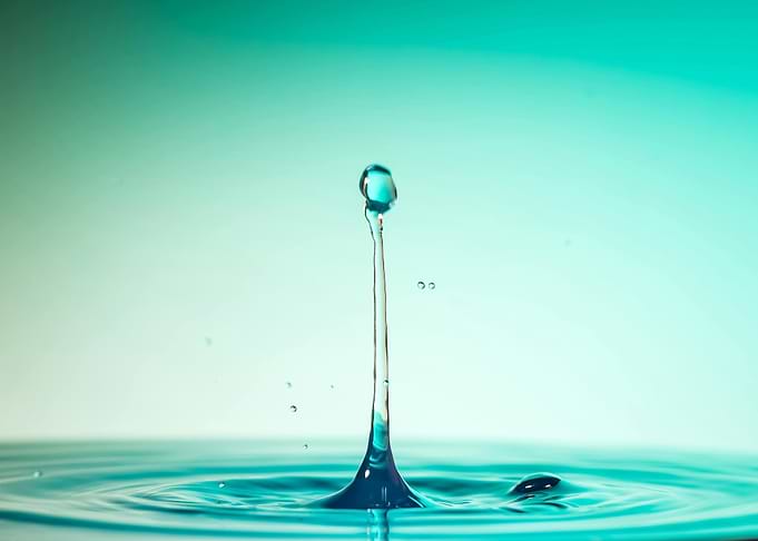 Water Drop Impact in Turquoise