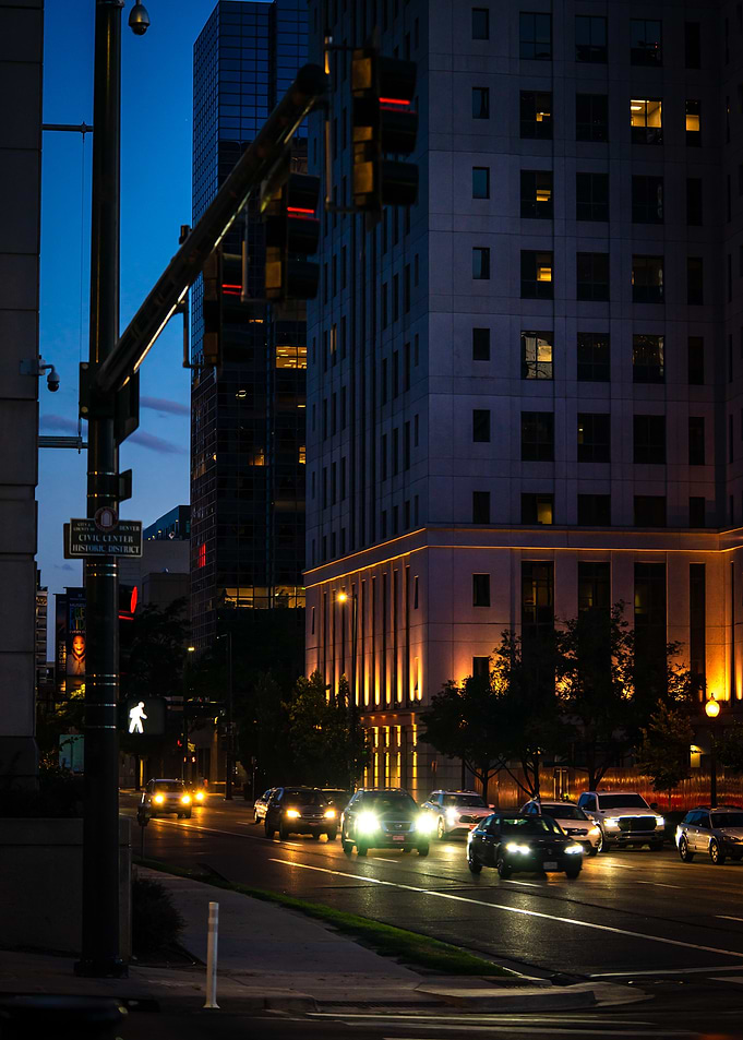 Denver street at night with cars