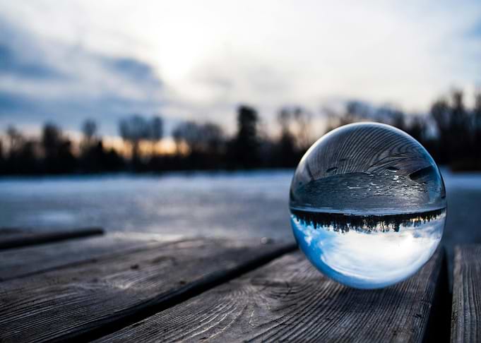 Crystal ball on wooden dock