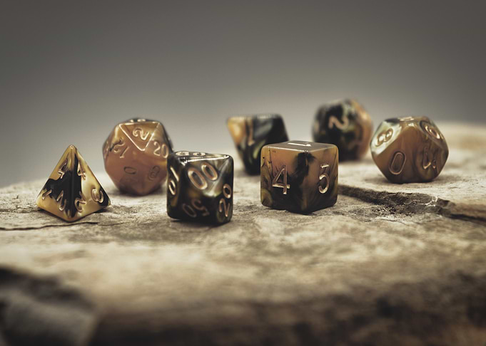 Set of Dice on Stone Surface