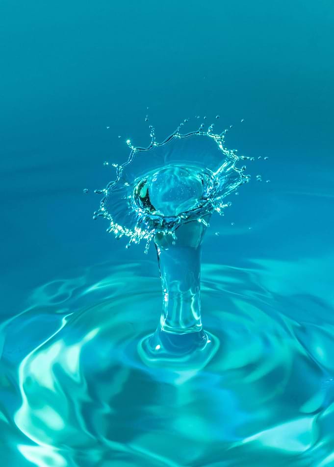 Water Drop Collision in Turquoise
