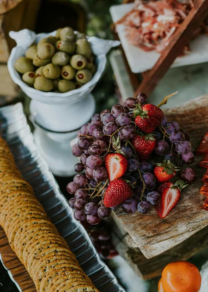 Gourmet Food Platter with Fruits and Snacks