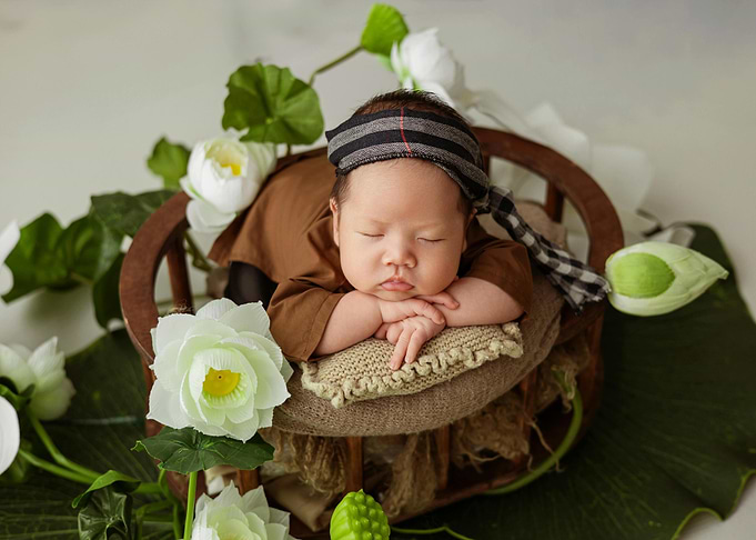 Sleeping Baby with Lotus Flowers