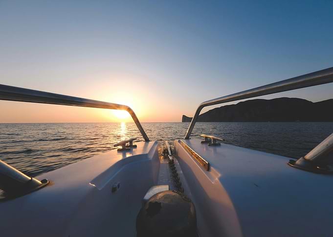 Boat at Sea During Sunset