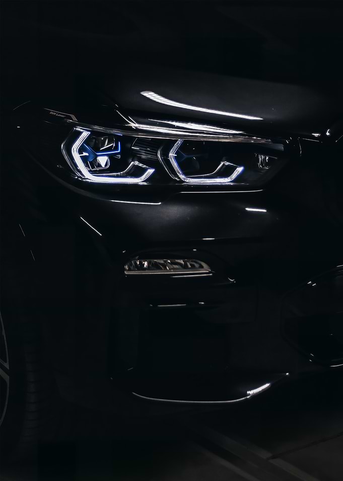 Black Car Headlights Close-Up