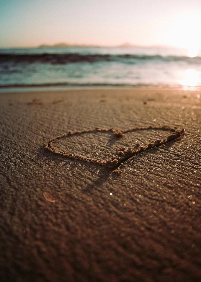 Heart Drawn in Sand at Beach