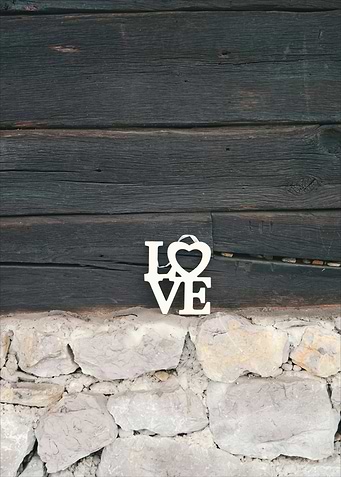 Love Sign on Stone and Wood