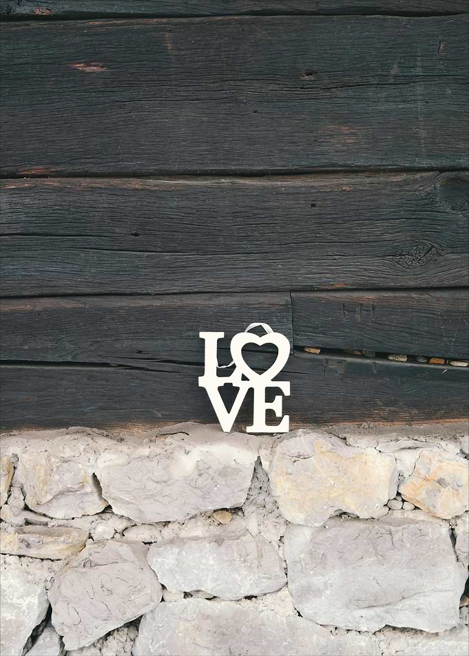Love Sign on Stone and Wood