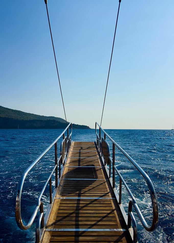 Boat deck over blue sea