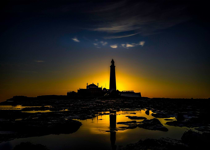 Lighthouse Silhouette at Sunset